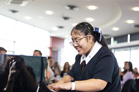 Nadia Charoensuk played the piano at the Professional Women