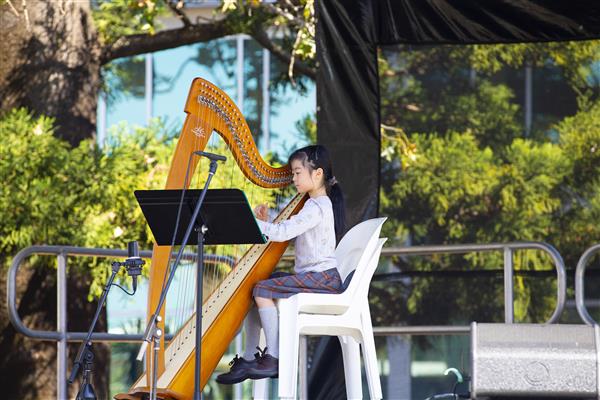 Eva Liu played the harp for St Margaret
